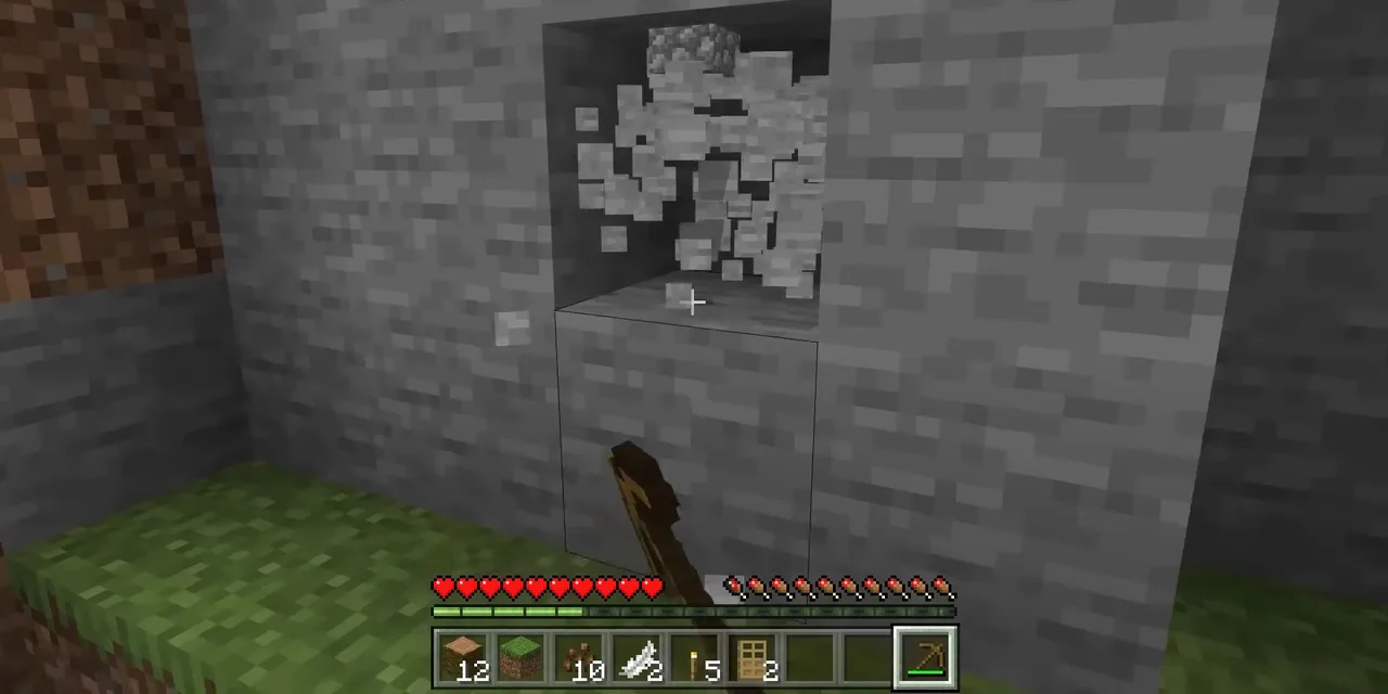 Breaking a stone block in Minecraft