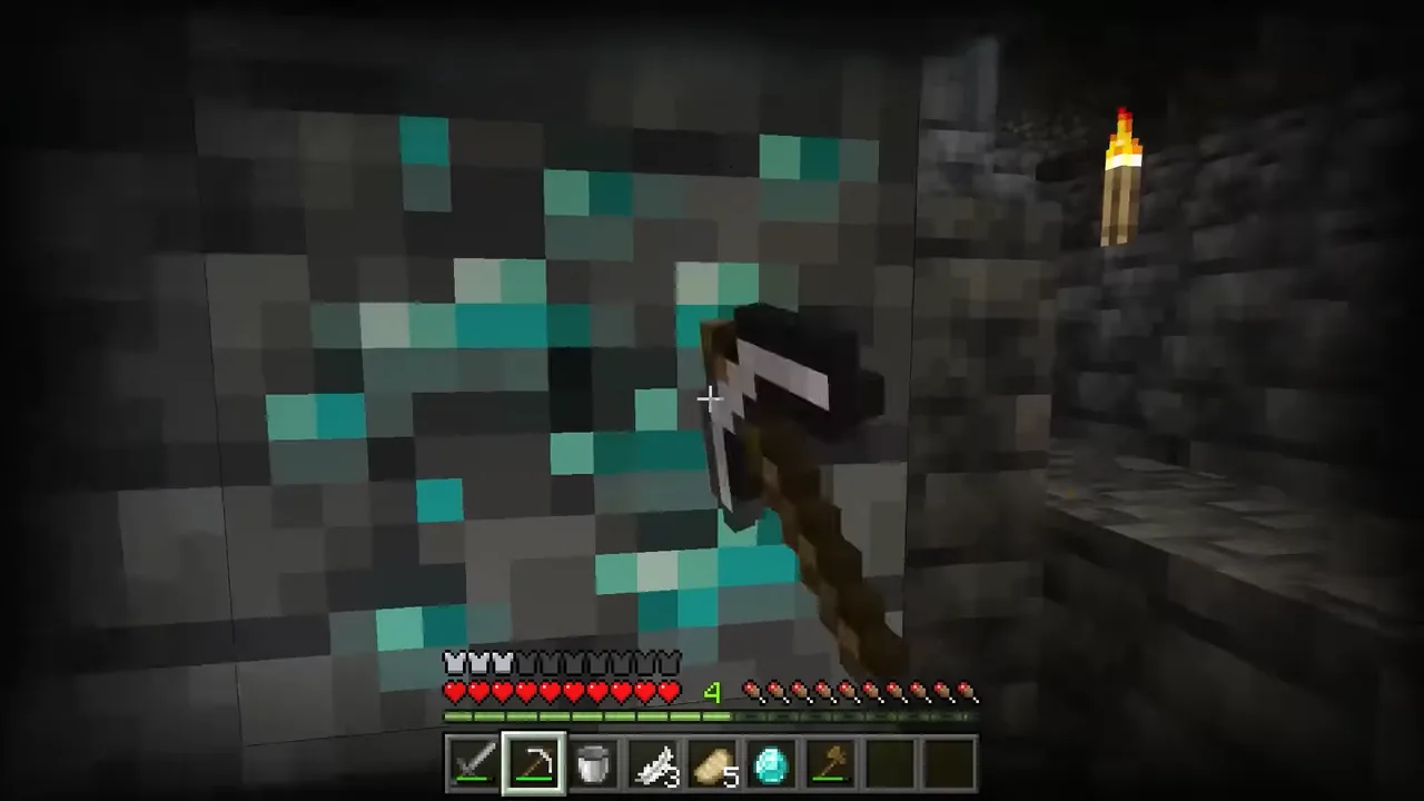 A player mining diamond ore in Minecraft