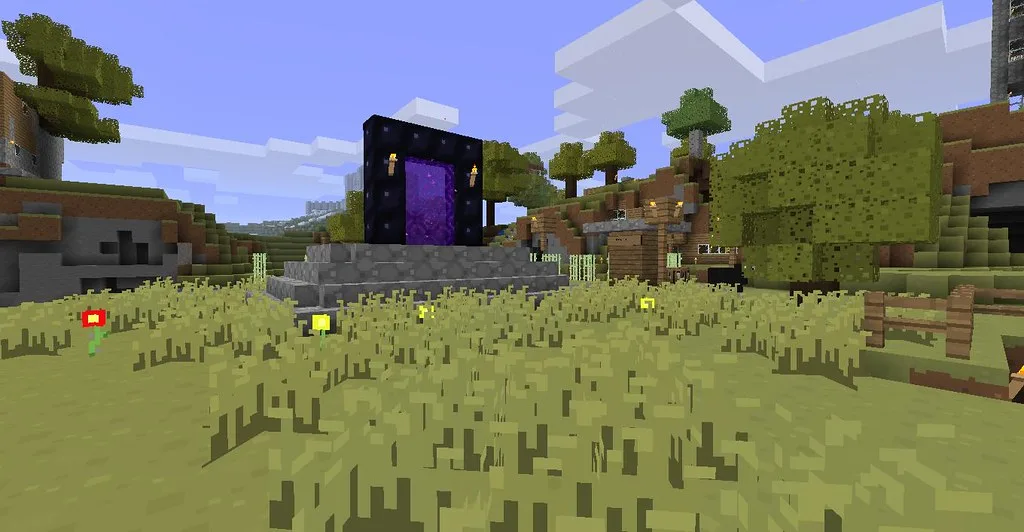 A lit nether portal in a Minecraft village